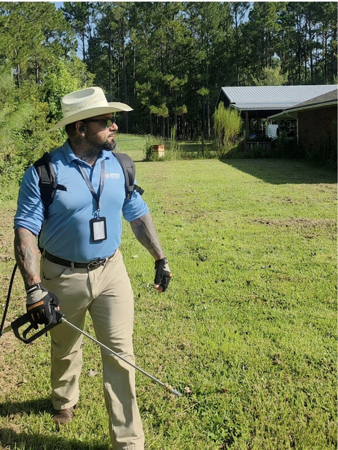 Simple Solutions technician working in a residential yard